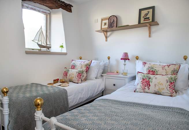 The delightful twin bedded room