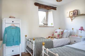 The twin bedded room is on the ground floor of Barn Owl Cottage