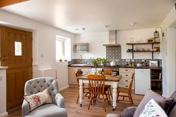 The open plan living-room is waiting to greet you