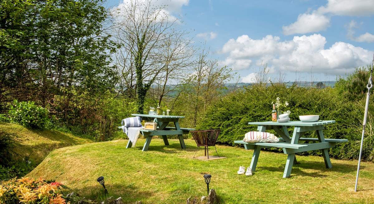 Enjoy the wonderful setting from this alternative spot for al fresco dining, shared with Bumblebee Cottage