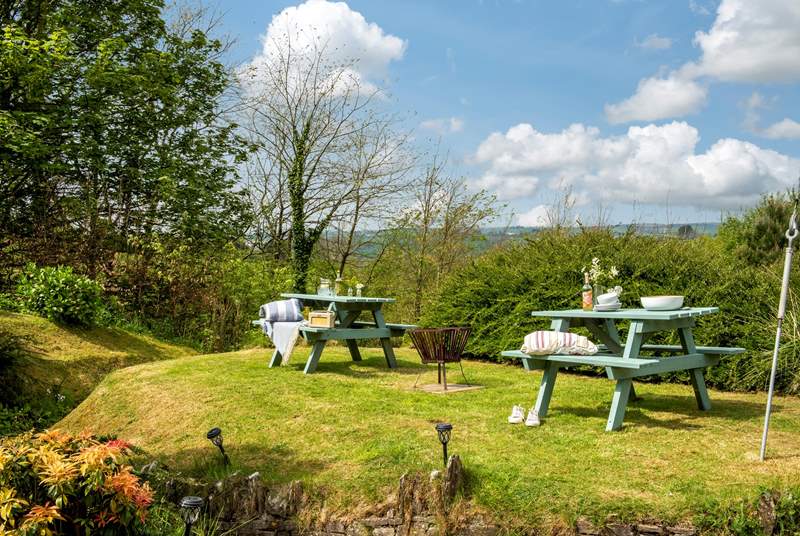 Enjoy the wonderful setting from this alternative spot for al fresco dining, shared with Bumblebee Cottage
