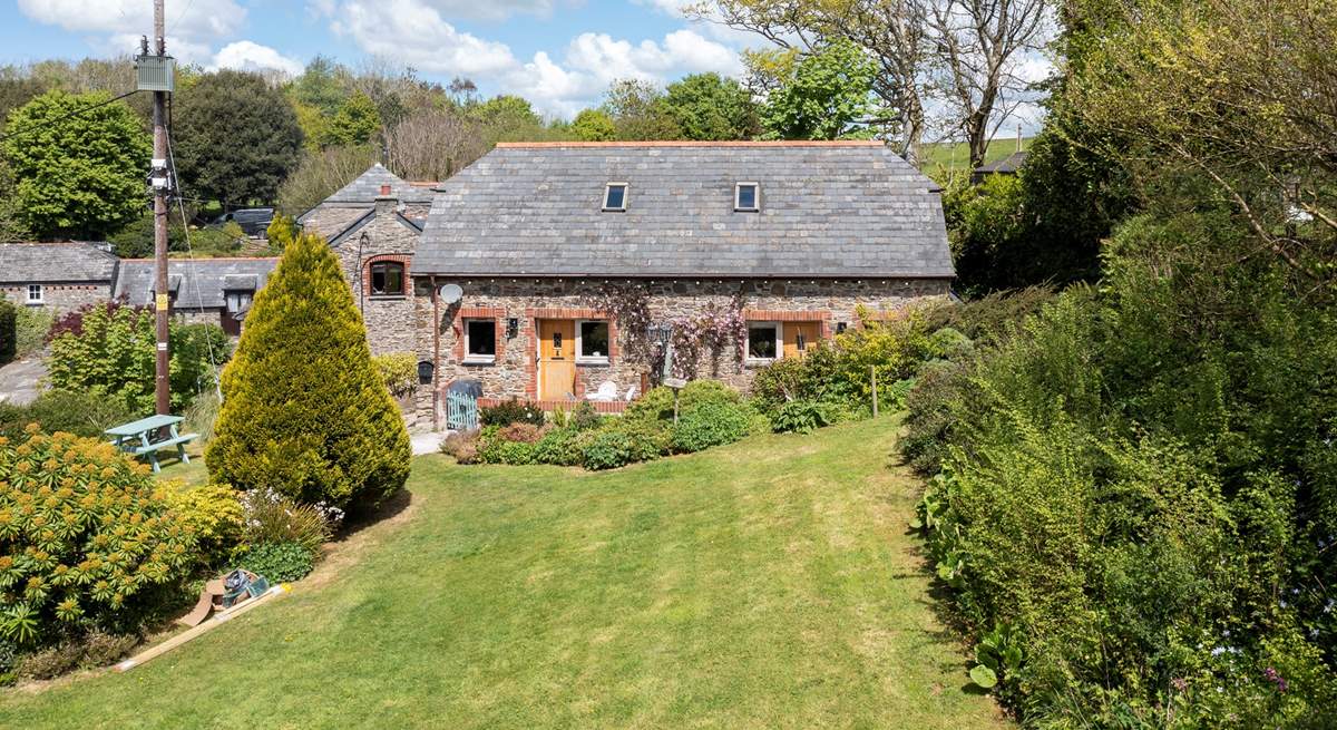 Barn Owl sits to the left-hand side of the property, one of a few barn conversions set around the original farm