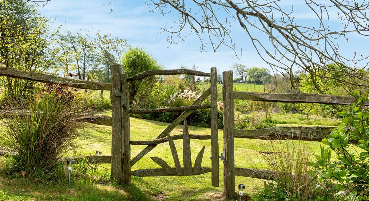 Step through the garden gate into the wild meadow garden and orchard