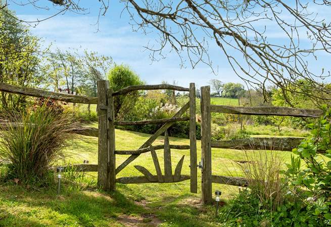 Step through the garden gate into the wild meadow garden and orchard