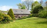 Bumblebee Cottage sits to the right-hand side of the property, one of a few barn conversions set around the original farm - Thumbnail Image