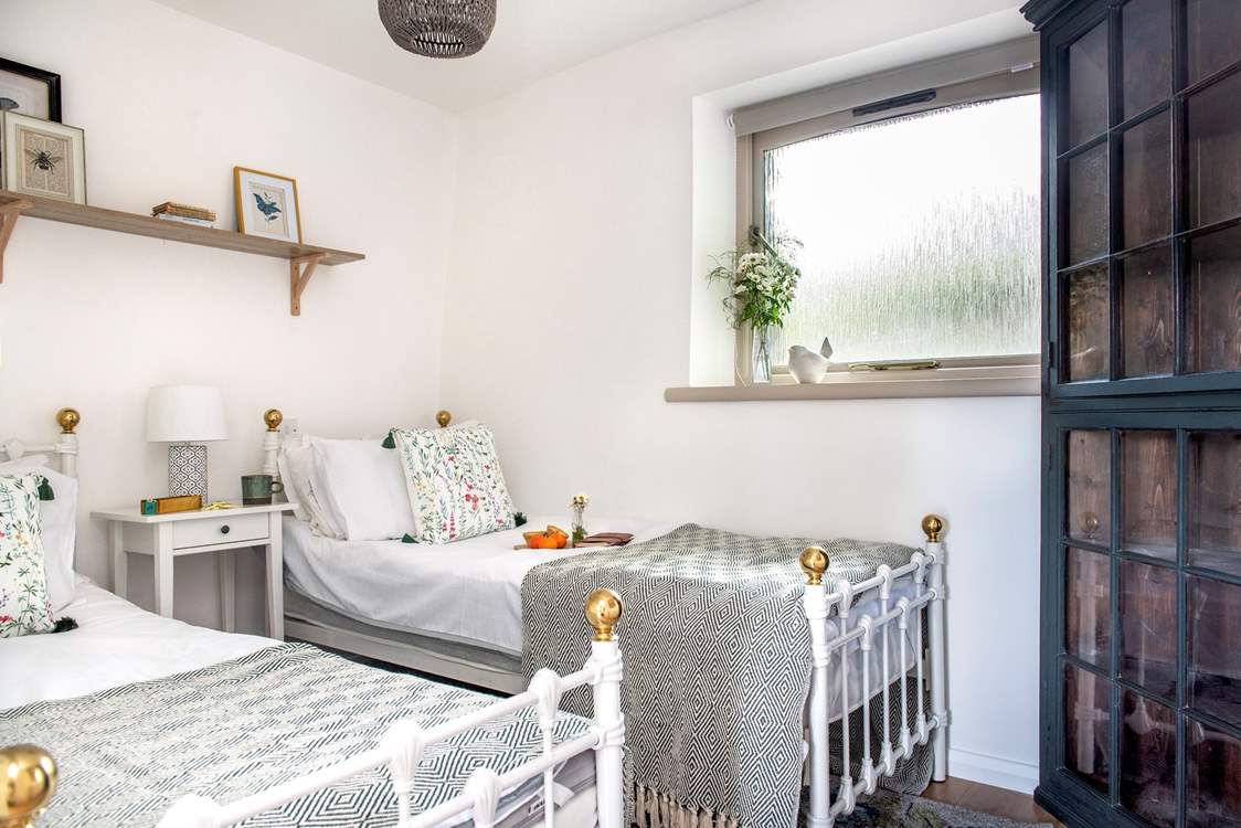 The twin bedroom is charming