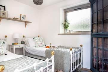 The twin bedroom is charming