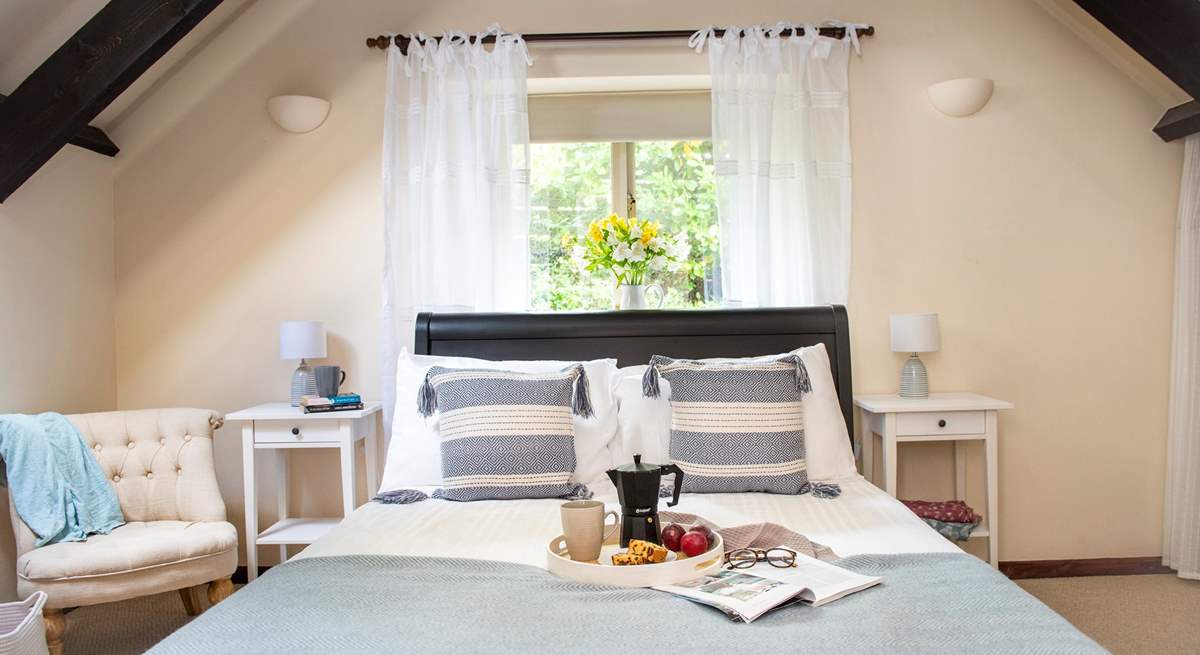 Lovely linen and gorgeous cushions adorn the beds