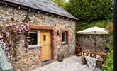 The sheltered terrace is the perfect spot for morning coffee leisurely holiday meals - Thumbnail Image