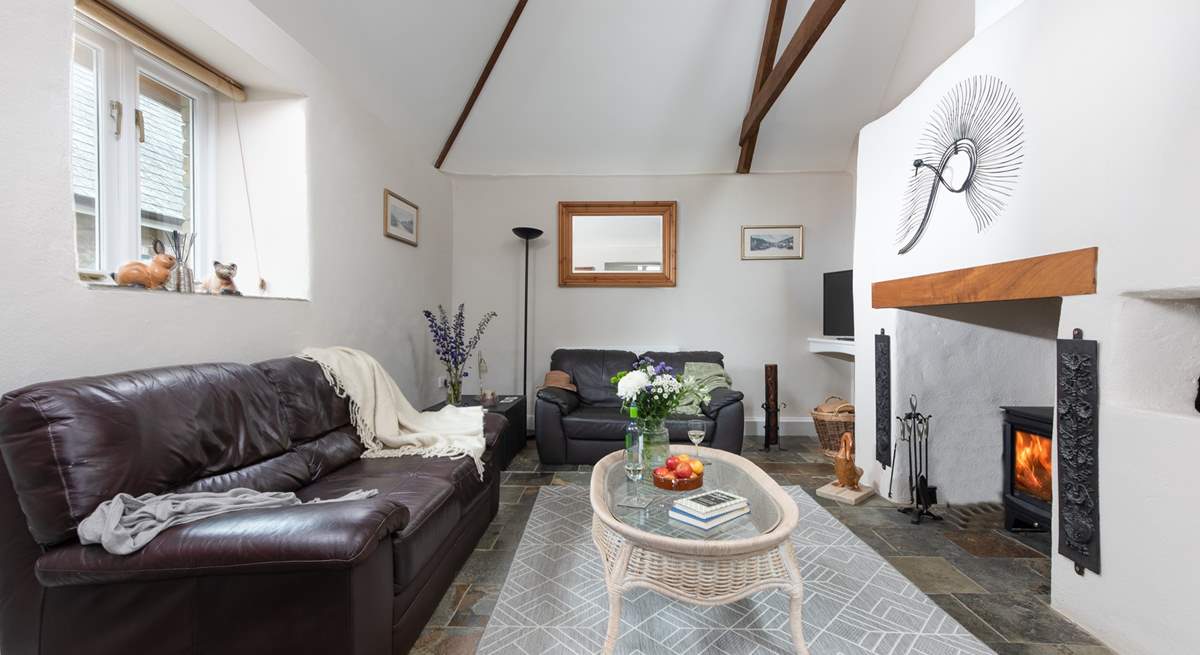 The sitting-room has lovely features and a wood-burner making this the perfect year-round retreat.