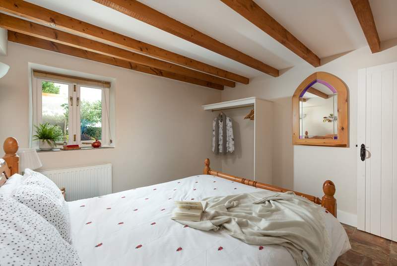 The double bedroom has characterful beams.