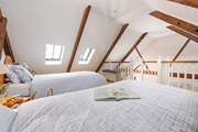 The pretty twin room is perfect for either children or adults.