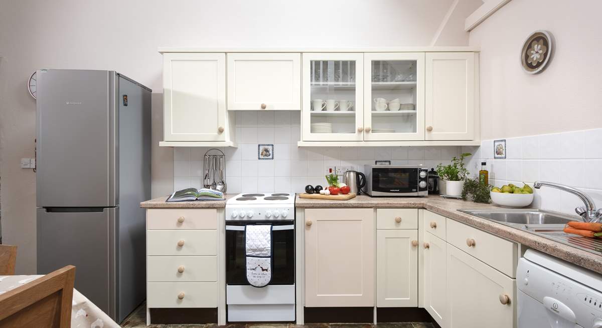 The kitchen is well-equipped and comes with the all-important dishwasher.