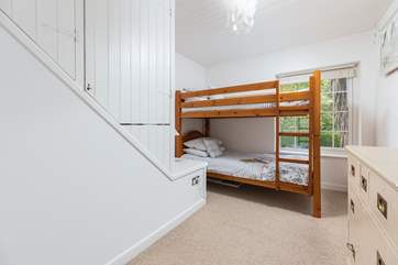 Children will love the traditional bunk-beds in bedroom 3.
