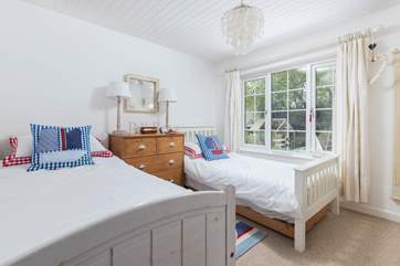 The delightful twin bedded room is ideal for either adults or children.
