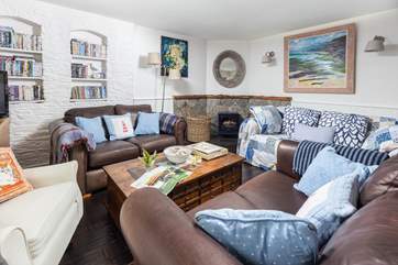 The cosy sitting-room with toasty wood-burner.