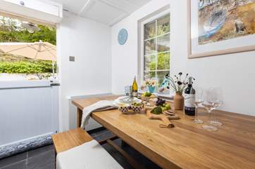 The gorgeous kitchen/diner opens out onto the rear patio.