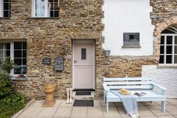 Enjoy your morning coffee outside the front door overlooking a quiet lane and surrounding countryside.