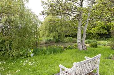 This gorgeous seat by the pond is a moments stroll away.
