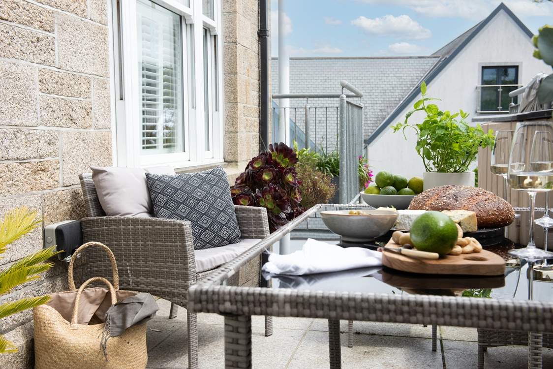 The private courtyard leads out from the kitchen/dining area.