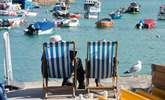 Watching the boats bobbing in the harbour is a relaxing pastime.  - Thumbnail Image