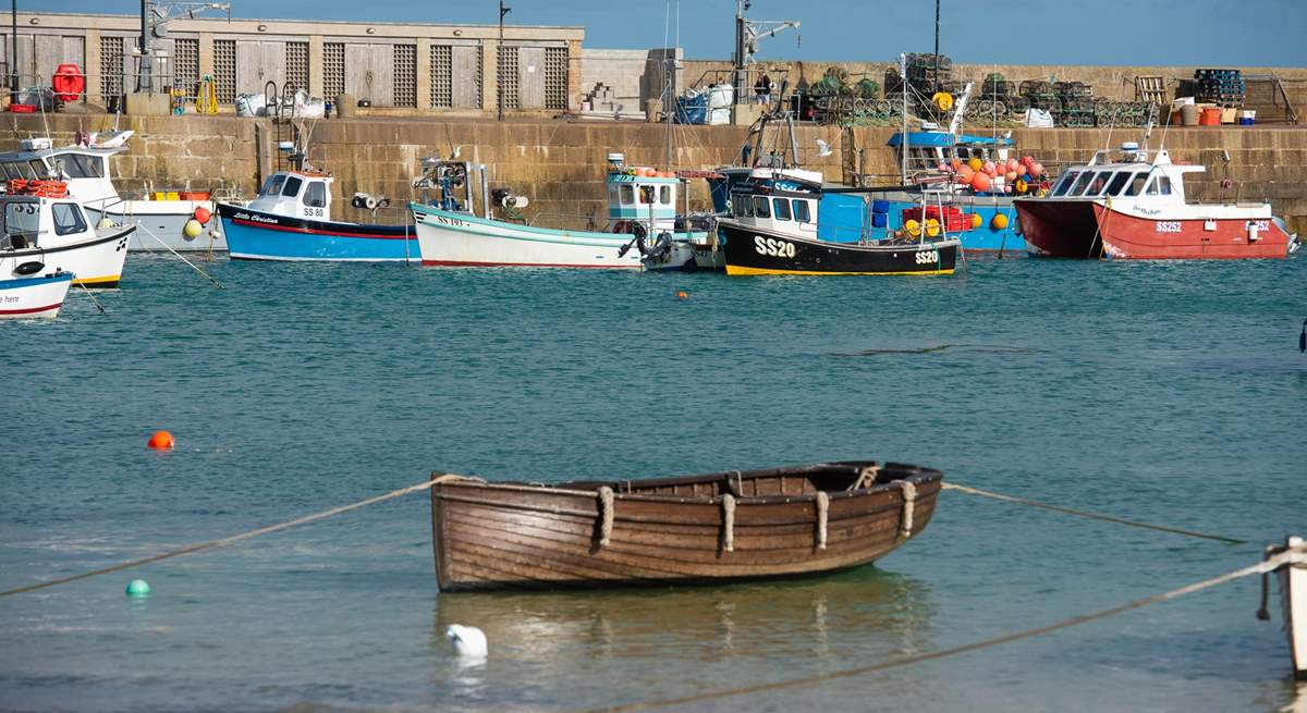 Traditional fishing boats still ply the waters of St Ives.