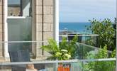 The balcony looks down towards the white sandy beach of Porthminster.  - Thumbnail Image