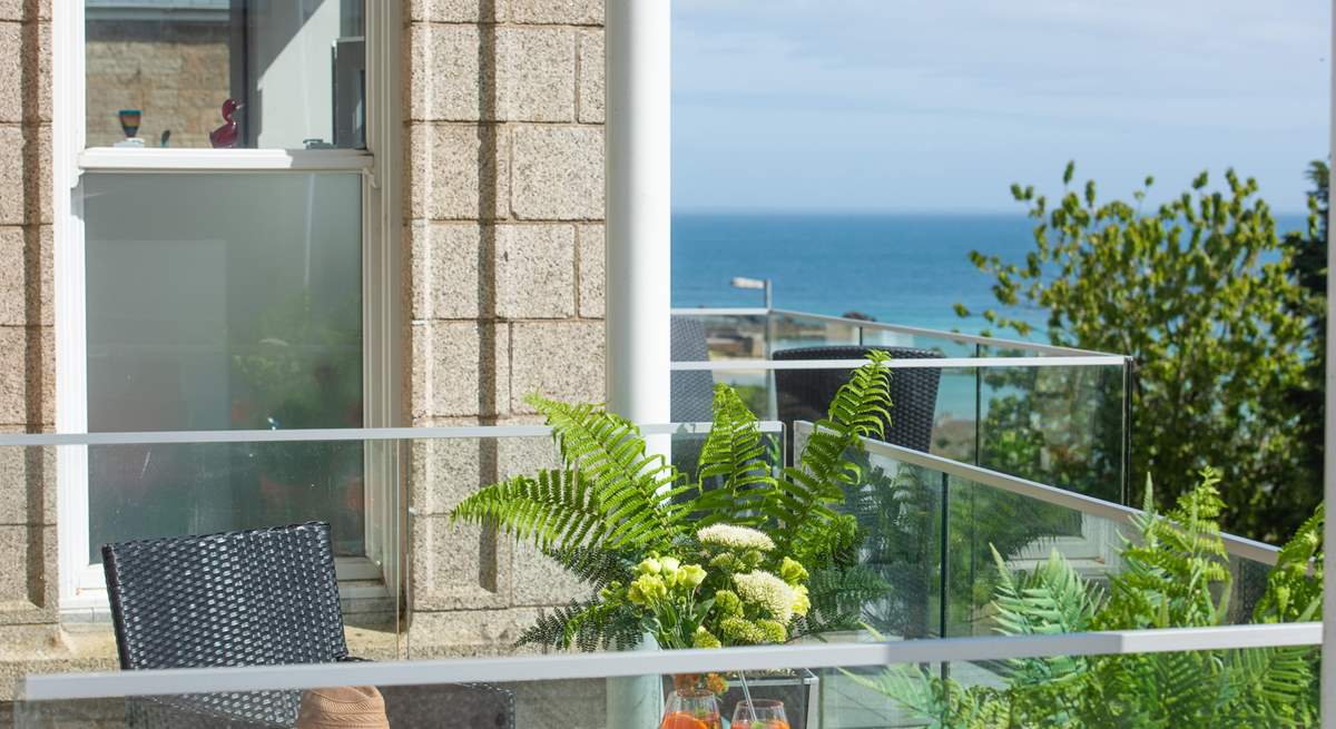 The balcony looks down towards the white sandy beach of Porthminster. 