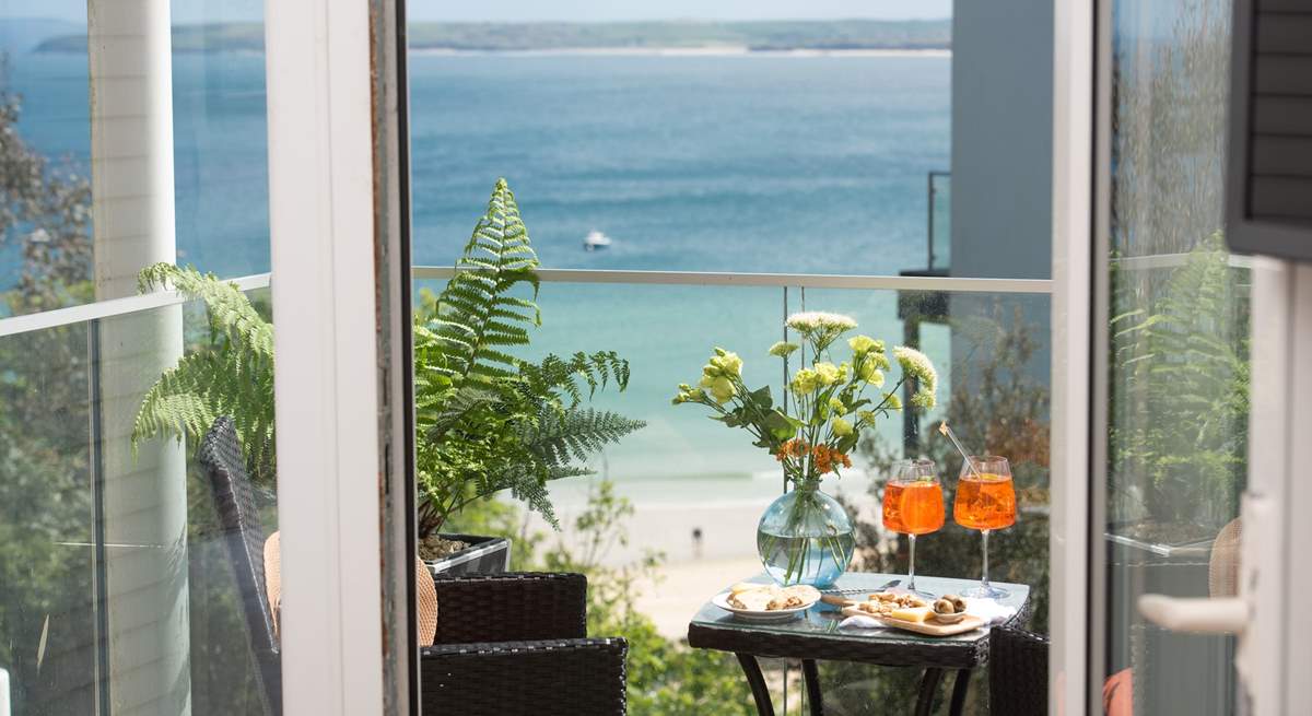 The balcony off bedroom 1 provides the perfect spot to take in the white sandy beach of Porthminster.