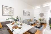 Cool shades invite you to relax in the sitting/dining-room.