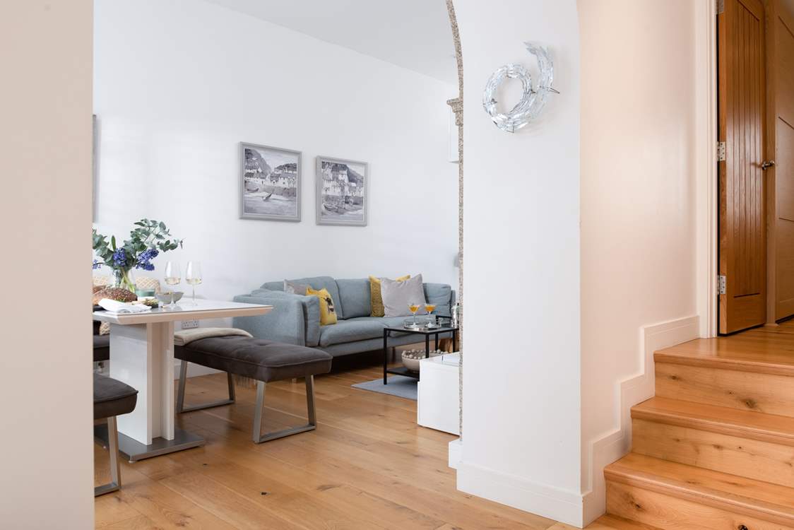 The archway leads from the kitchen to the sitting/dining-room.