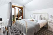The bedrooms are a delight and bedroom one on the first floor has a balcony, the perfect place for a morning cuppa.
