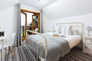 The bedrooms are a delight and bedroom one on the first floor has a balcony, the perfect place for a morning cuppa.