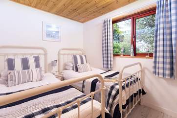 The twin bedroom on the ground floor is perfect for either children or adults.