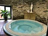 Settle down in the luxurious hot tub.