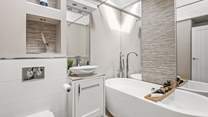 There is a beautifully finished bathroom situated next door to bedroom two.