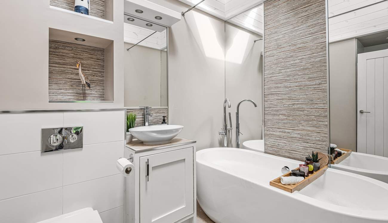 There is a beautifully finished bathroom situated next door to bedroom two.