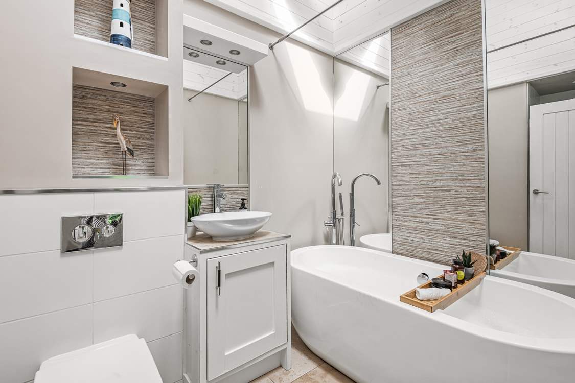 There is a beautifully finished bathroom situated next door to bedroom two.