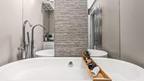 Relax in the gorgeous free-standing bathtub.