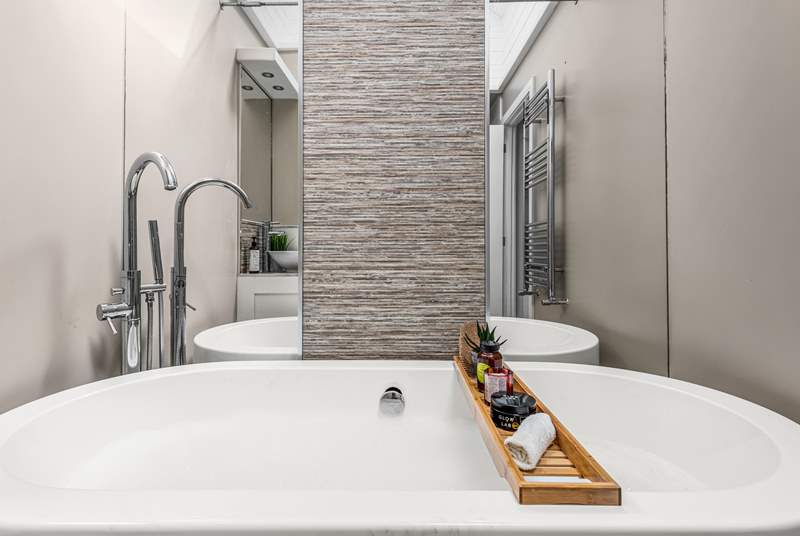 Relax in the gorgeous free-standing bathtub.