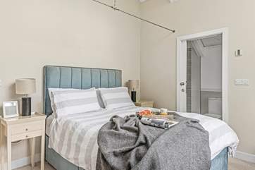 Bedroom one comes equipped with a lavish king-size bed, TV and an excellent en suite.