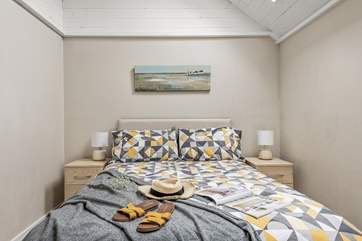 The double bed's plush bedding ensures a great night's sleep.