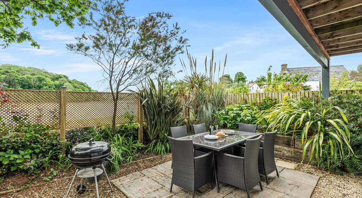 Enjoy a spot of al fresco dining in the wonderful garden area.