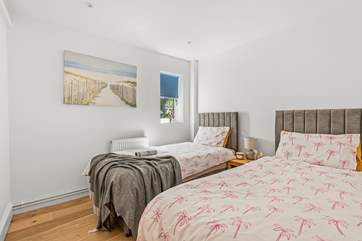 ...or a delightful twin bed arrangement.