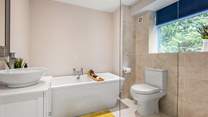 Another gorgeous bathroom can be found on the lower floor. This is the en-suite to Bedroom three.