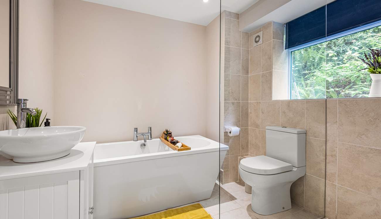 Another gorgeous bathroom can be found on the lower floor. This is the en-suite to Bedroom three.