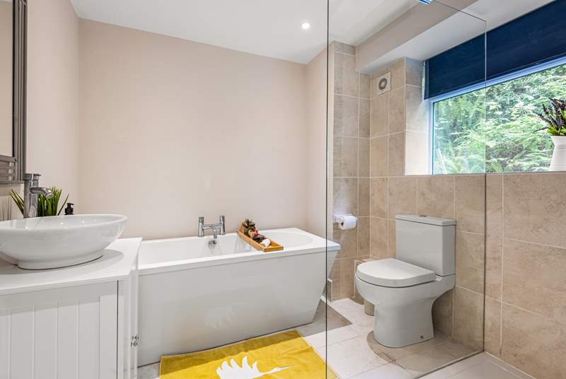 Another gorgeous bathroom can be found on the lower floor.