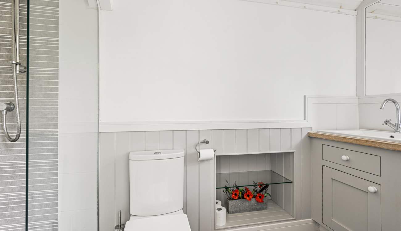 Unwind in bedroom one's gorgeous en suite.