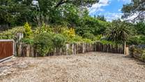 There is ample parking for two to three cars behind the property.