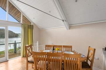 Gaze out of the window while enjoying delicious meals on the lovely dining table.